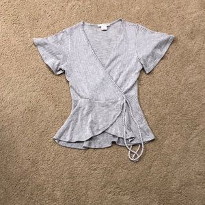 Caution to the wind wrap top